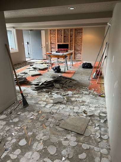 Interior flooring and fireplace in progress