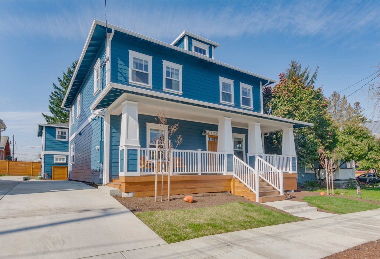 Double hung windows on a Craftsman home