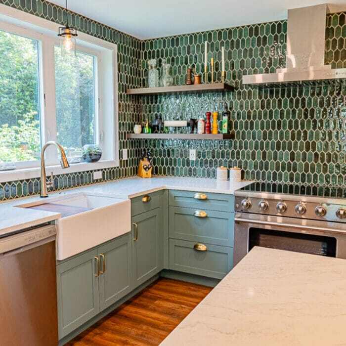 Garden Home-Whiteford Green Kitchen Addition featuring apron front sink and juniper green cabinets by knight cabinetry