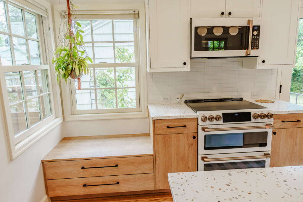 Foursquare kitchen remodel in Portland's king neighborhood featuring custom window seat