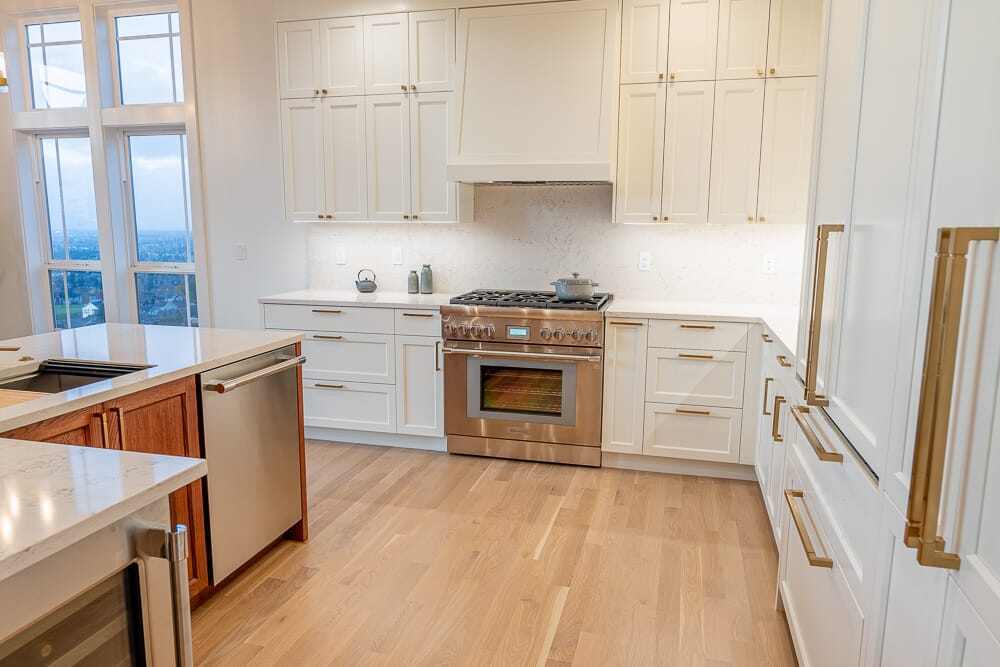 Happy Valley insurance restoration project with stainless steel appliances and white cabinets