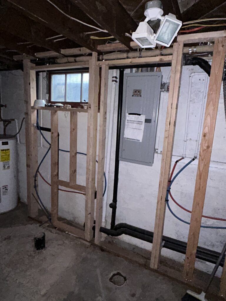 basement walls with wood framing that does not meet code