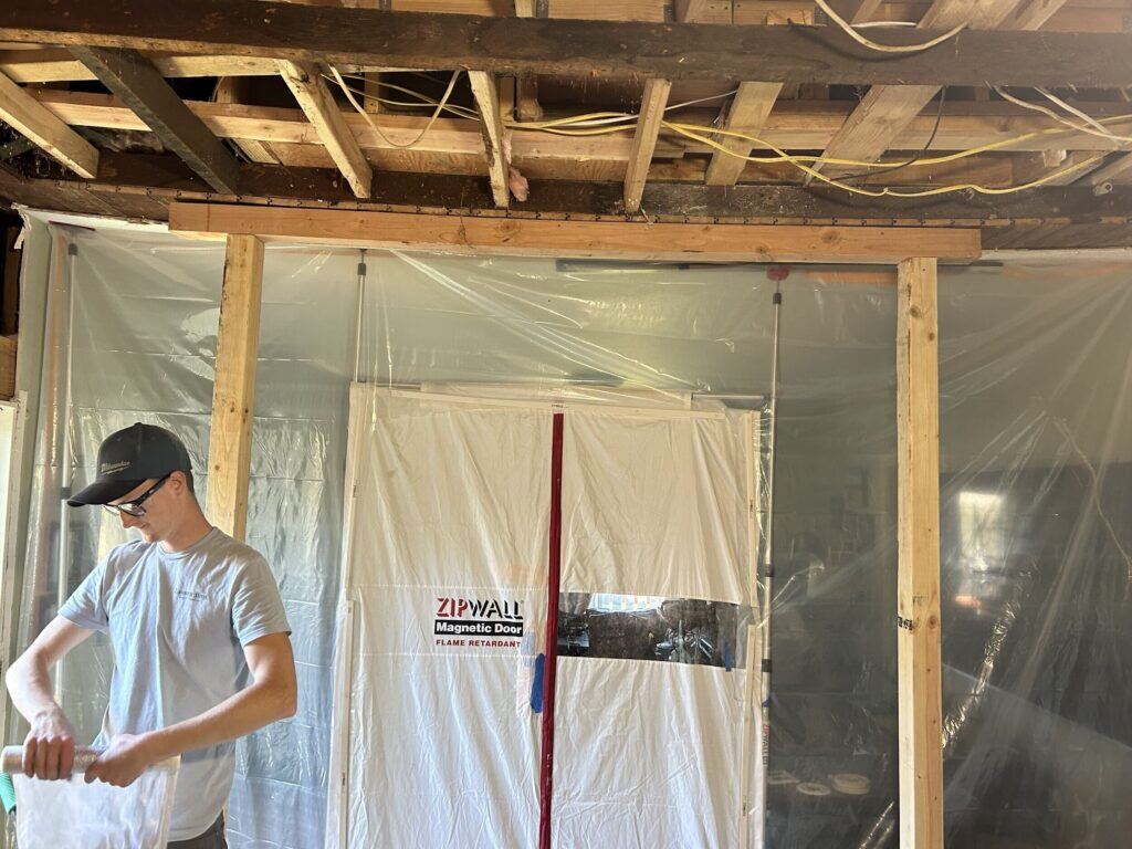 bowed and sagging ceiling from shoddy contractor work on a second story addition