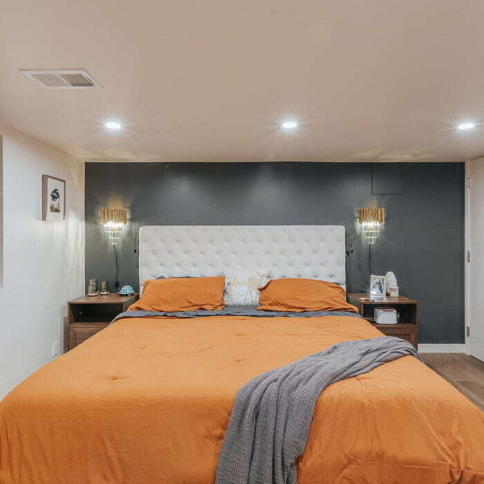 Southeast Portland basement remodel featuring orange bed