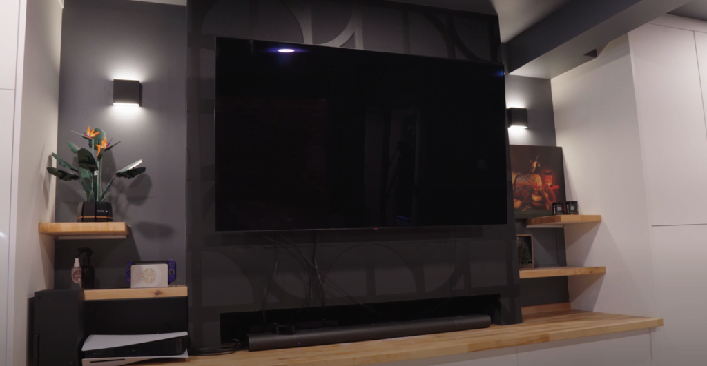 home theater with cinema style light sconces