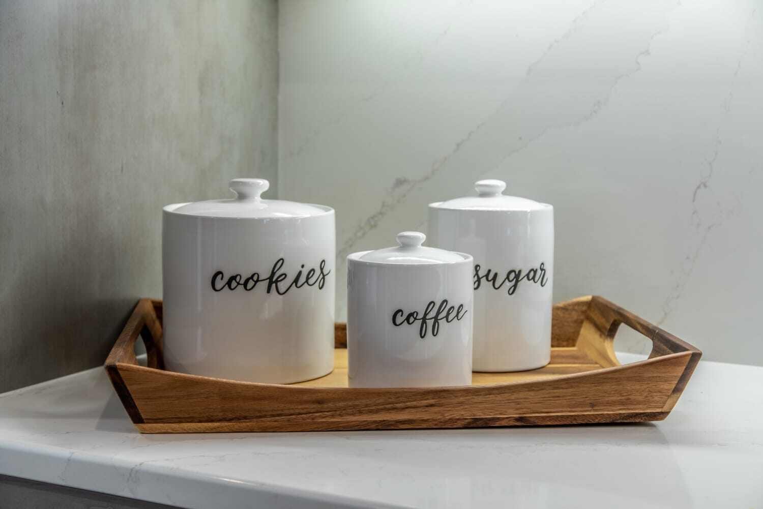 kitchen jars of coffee, sugar, and coffee