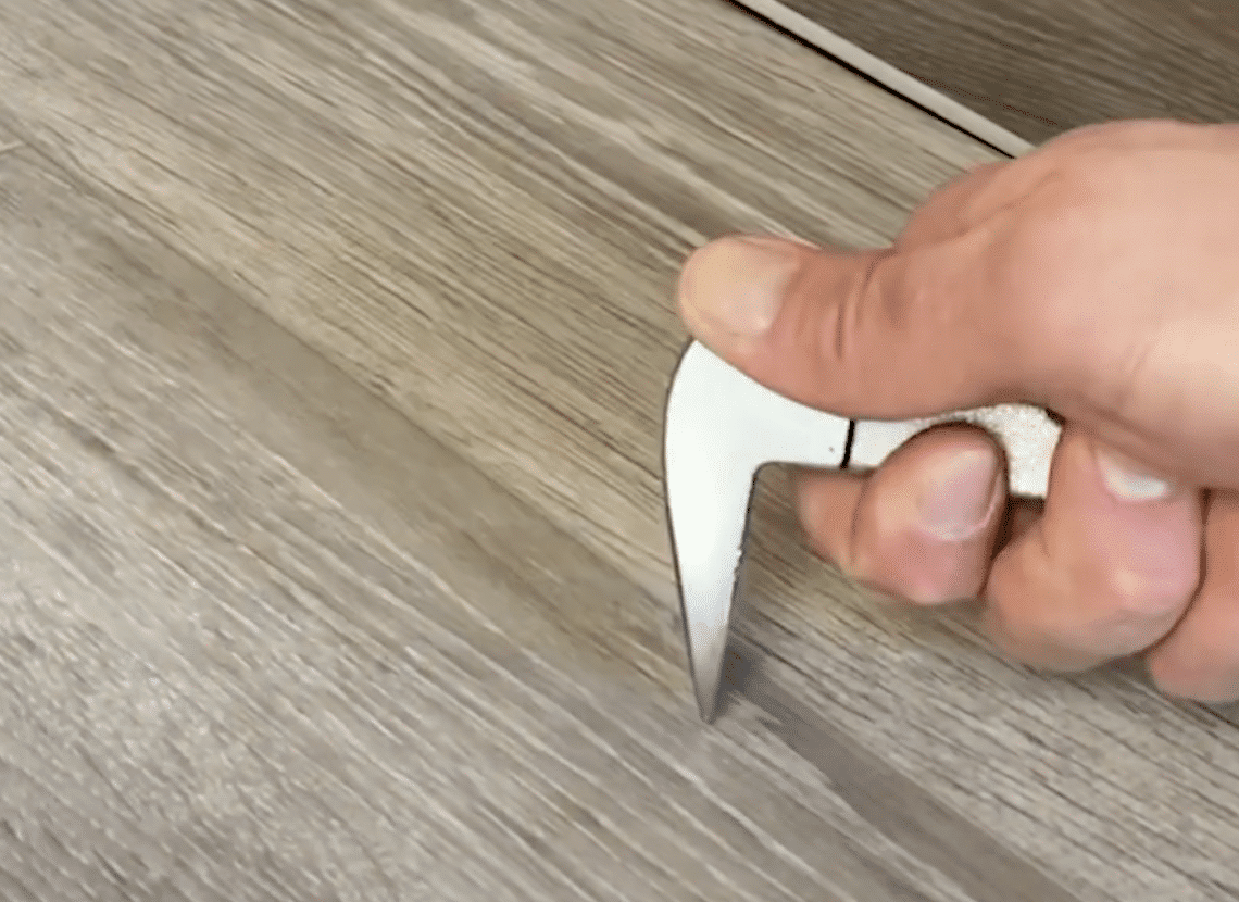 scratch resistant flooring test - Cat's Paw scratch test on laminate