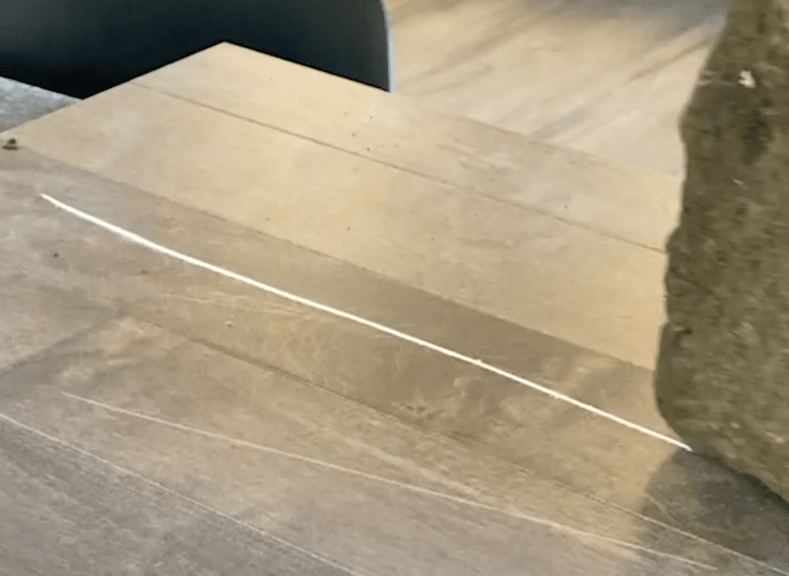 scratch resistant flooring test - rock scratch test on maple hardwood