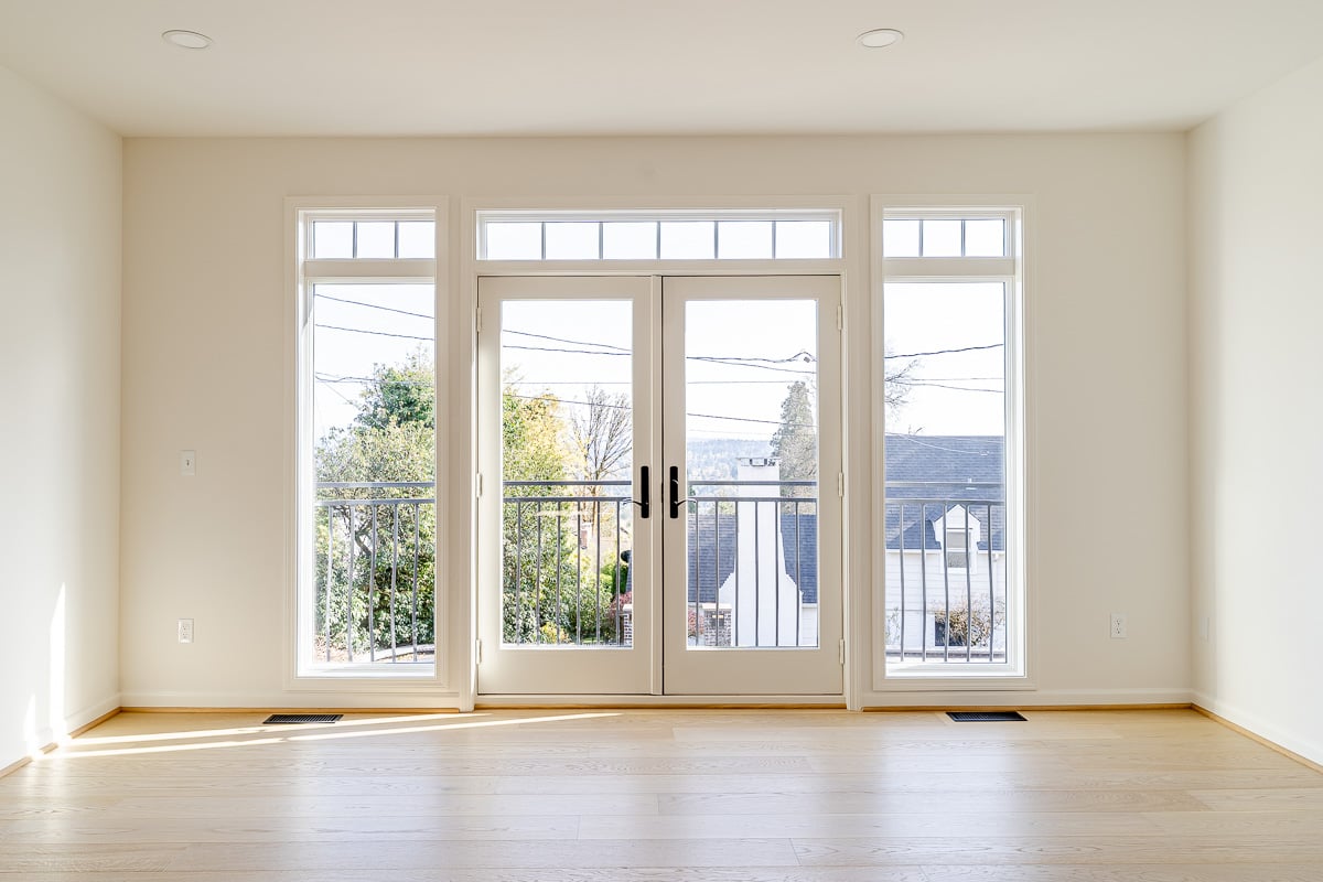 Big doubles doors and windows showcasing a West Hills view