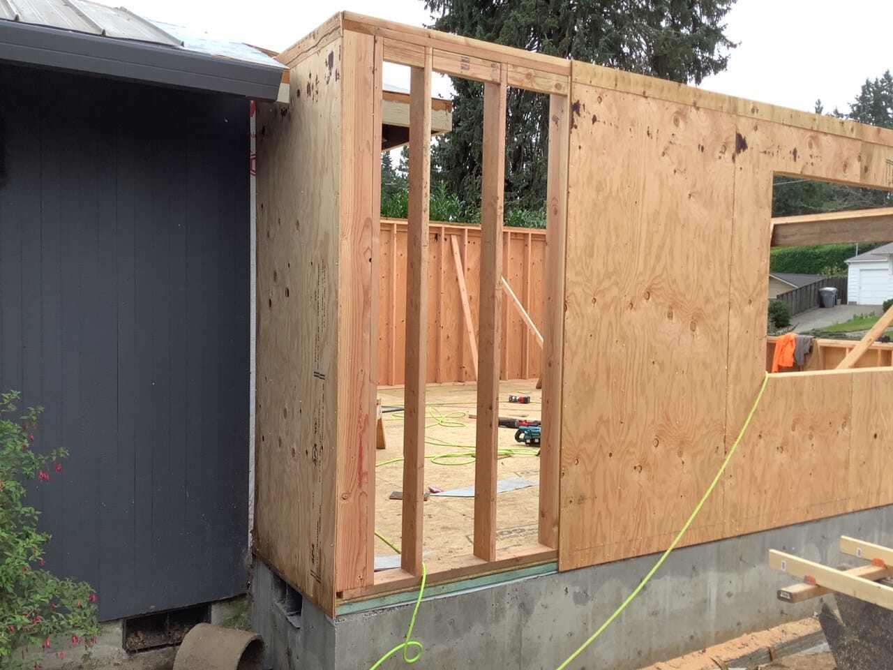 What factors affect the cost of a home addition?