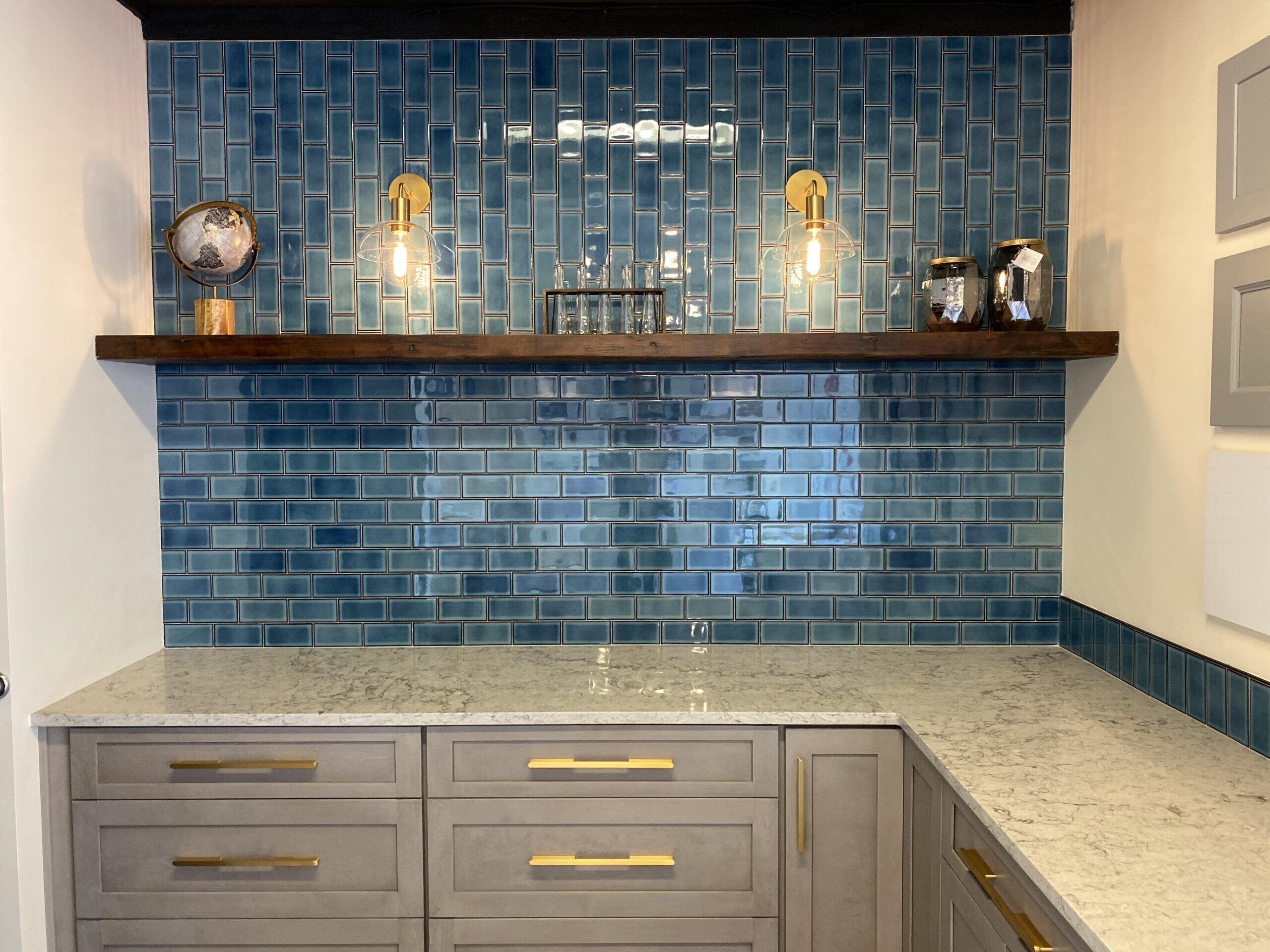 lamont bros showroom blue subway tiles