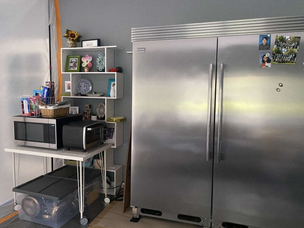 home renovation stress: temporary kitchen with fridge