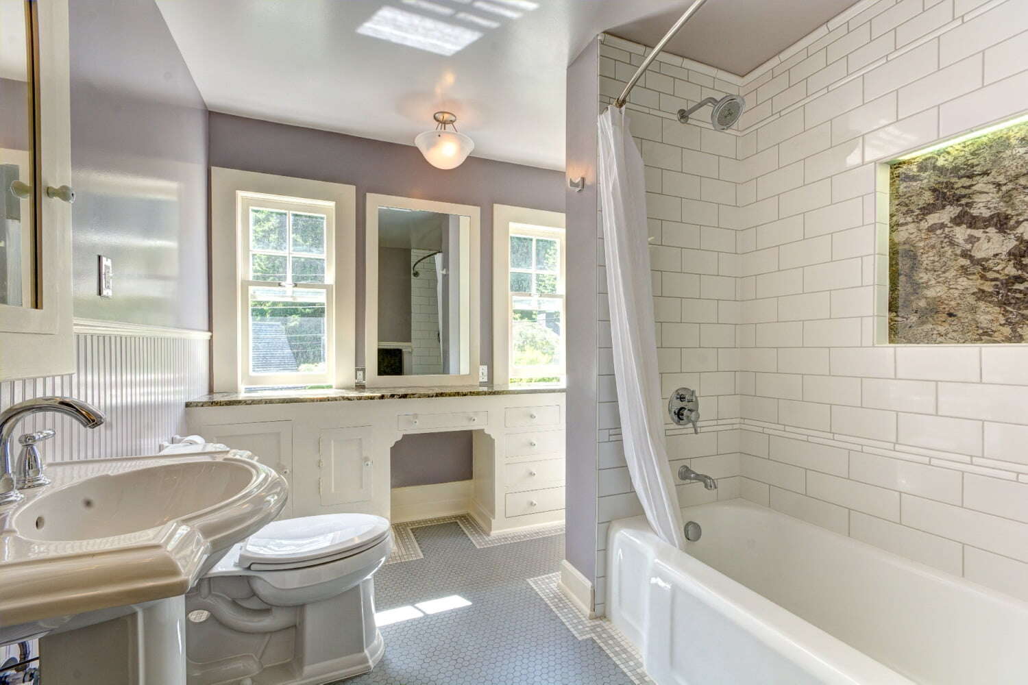 working with a design/build firm: light purple bathroom